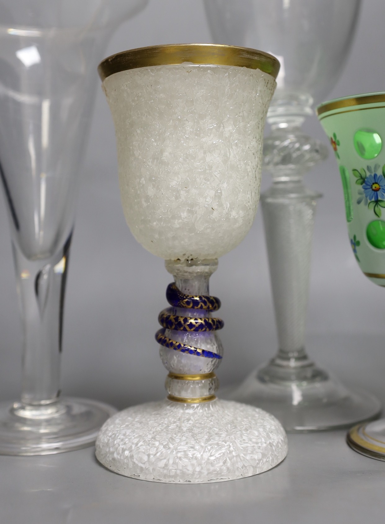 A selection of five 19th/20th century glasses (one a.f.). Tallest 29cm, including an American? White cased flint glass goblet with blue snake mounted stem